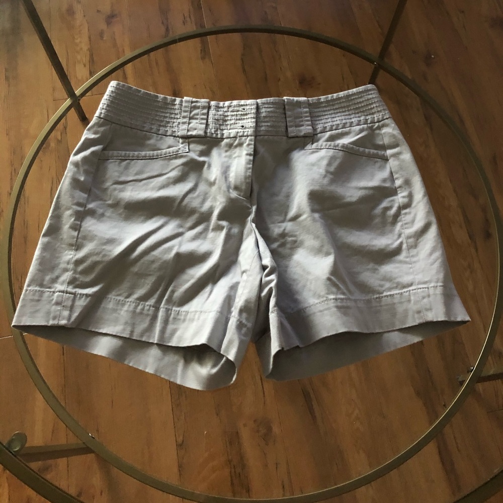 Barely worn white shorts with silver stitching